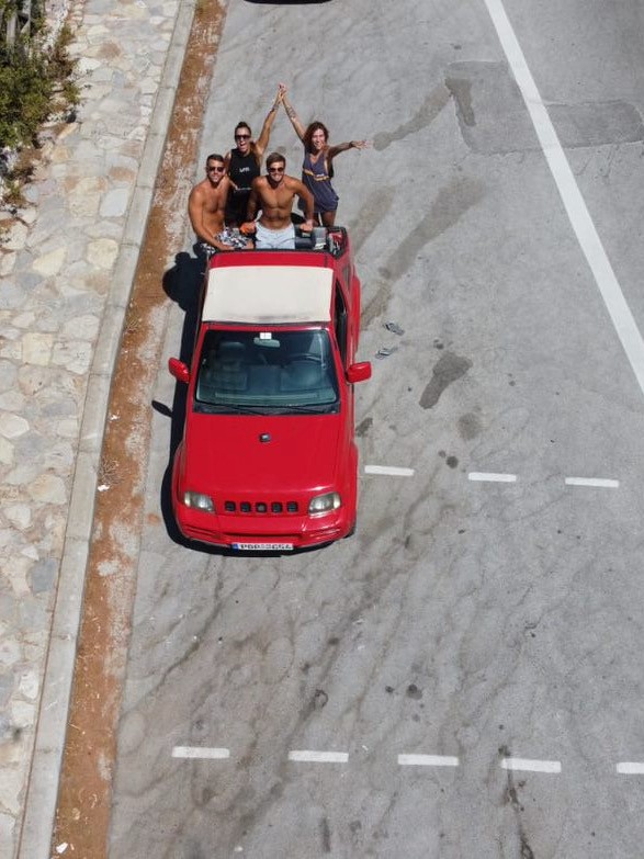 stay solo-travellers carpooling together on a roadrtip around rhodes island