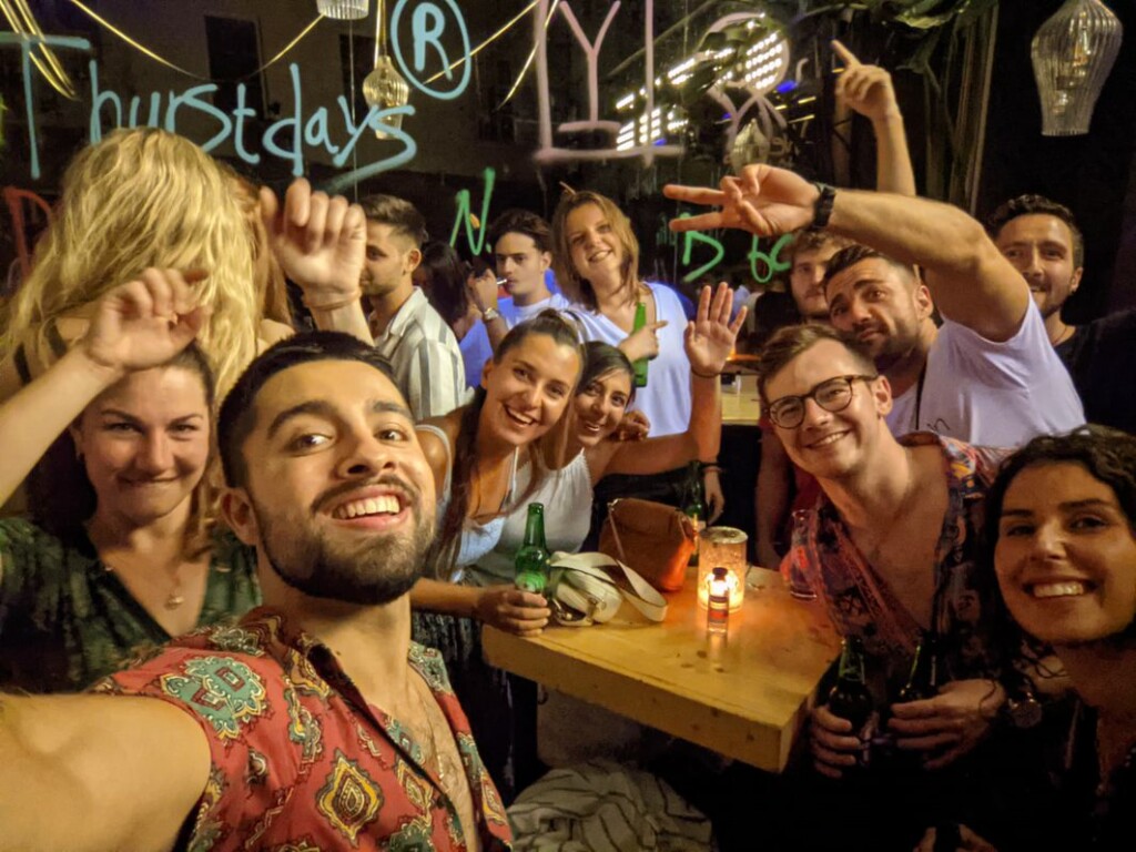 happy travellers going out together exploring nightlife and best bars in rhodes
